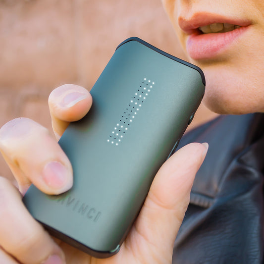 Woman using Green IQC, up close.