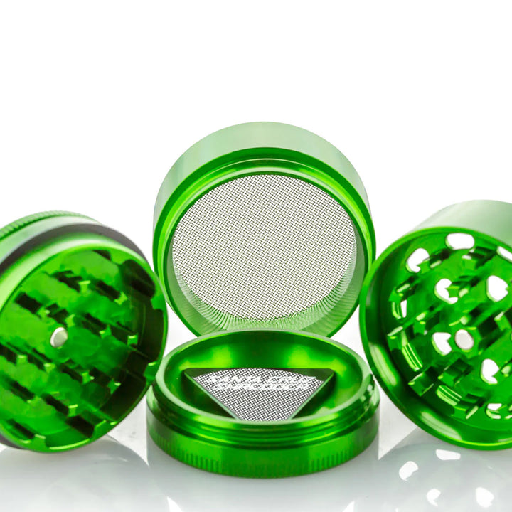 All Separate Parts of the Green 4 piece Santa Cruz Shredder.