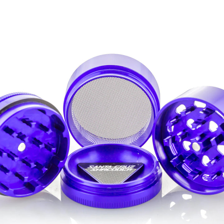 All Separate Parts of the Purple 4 piece Santa Cruz Shredder.